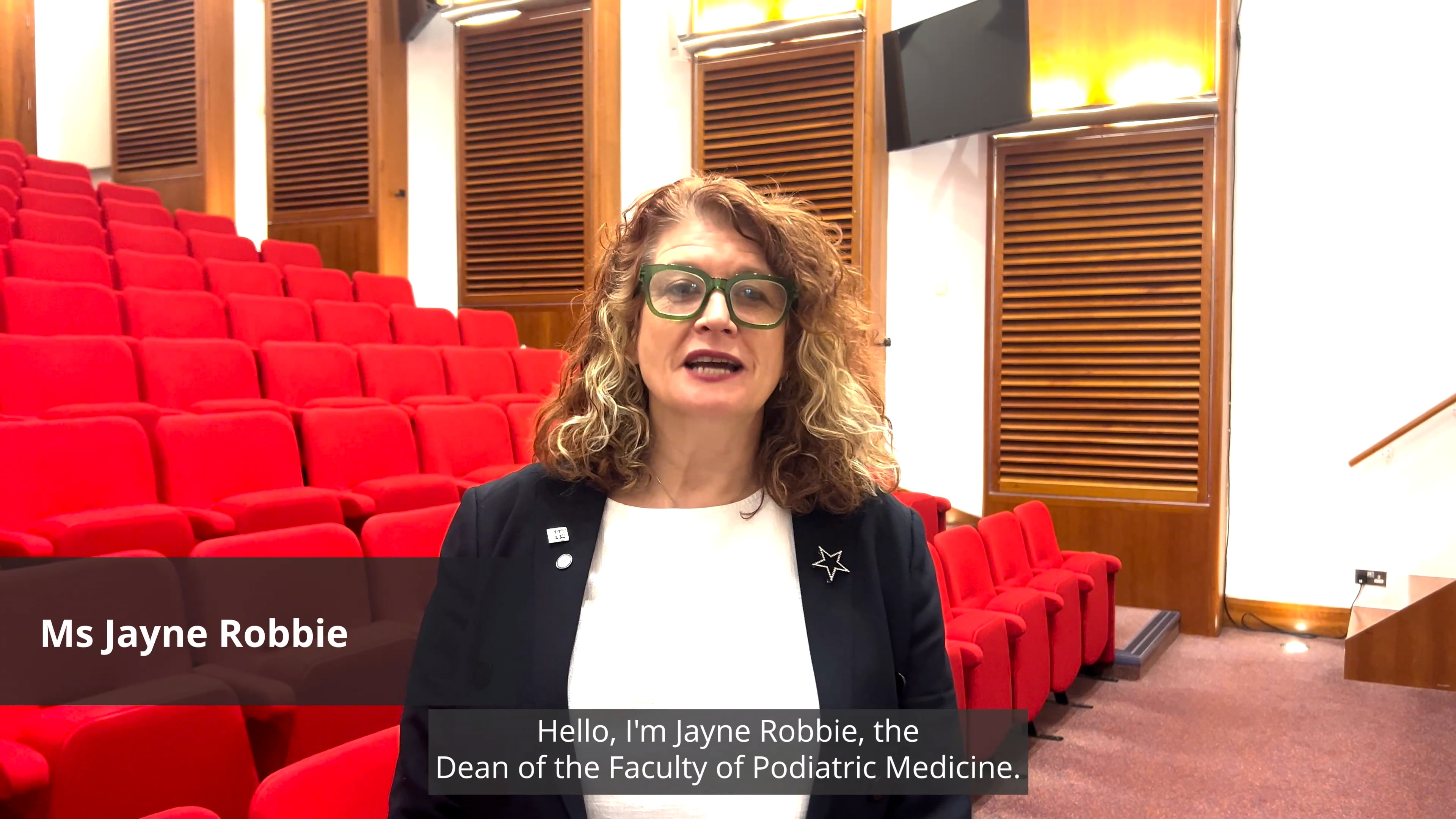 Dean of the Faculty of Podiatric Medicine Jayne Robbie speaking in lecture theatre